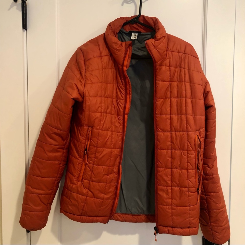Forclaz Orange puffer jacket in size S.
